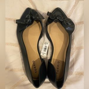 Torrid dorsay pointed flat with a bow